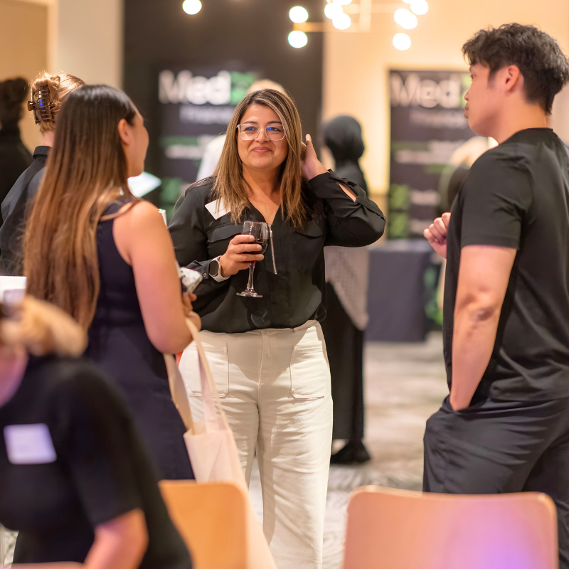 Ameena talking with guests