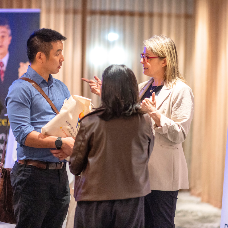 Julie talking with guests